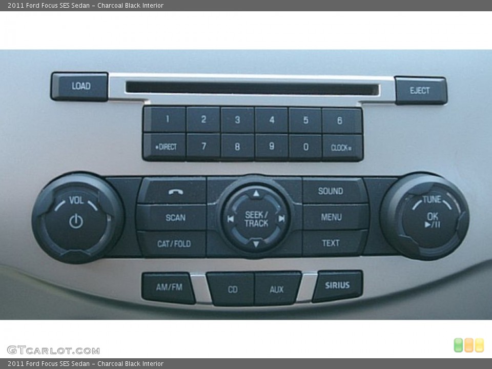 Charcoal Black Interior Controls for the 2011 Ford Focus SES Sedan #72427592