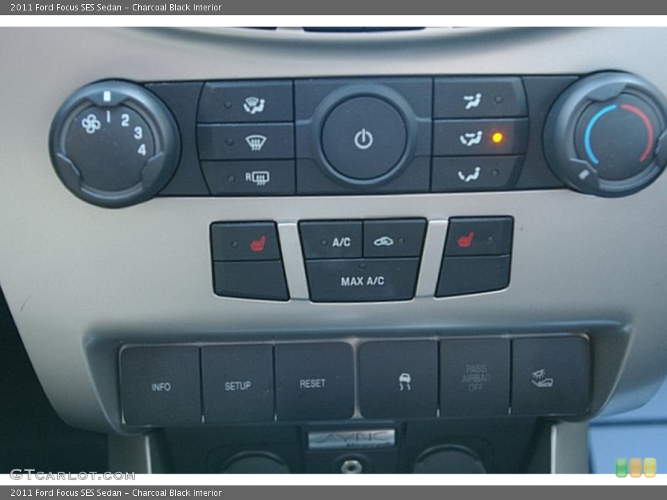 Charcoal Black Interior Controls for the 2011 Ford Focus SES Sedan #72427616