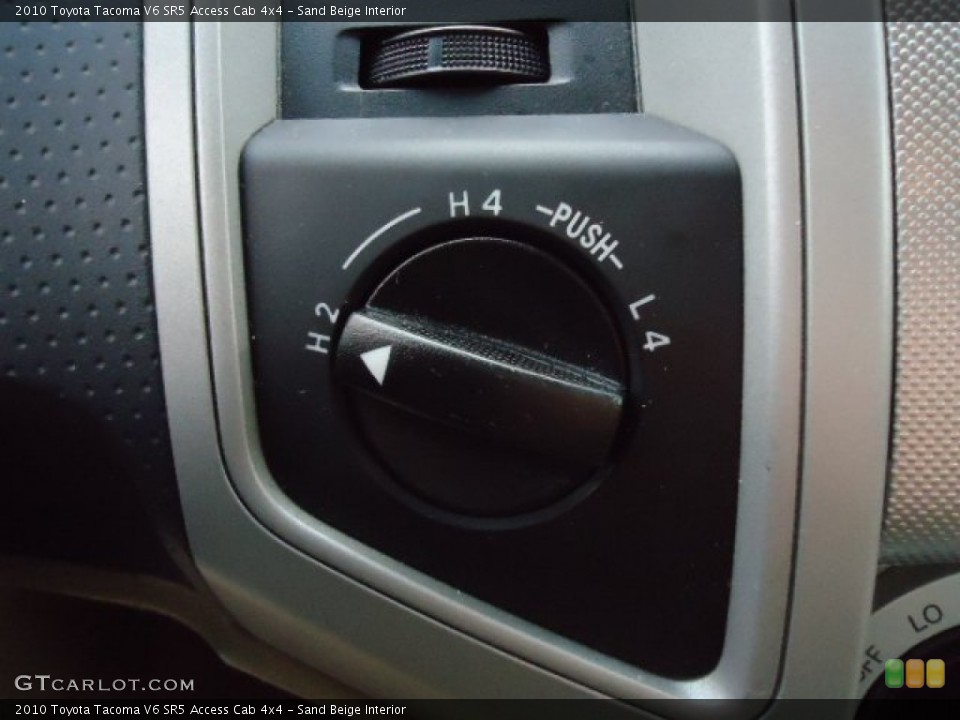 Sand Beige Interior Controls for the 2010 Toyota Tacoma V6 SR5 Access Cab 4x4 #72487696