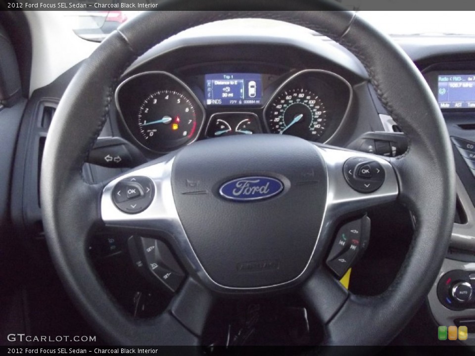 Charcoal Black Interior Steering Wheel for the 2012 Ford Focus SEL Sedan #72496669