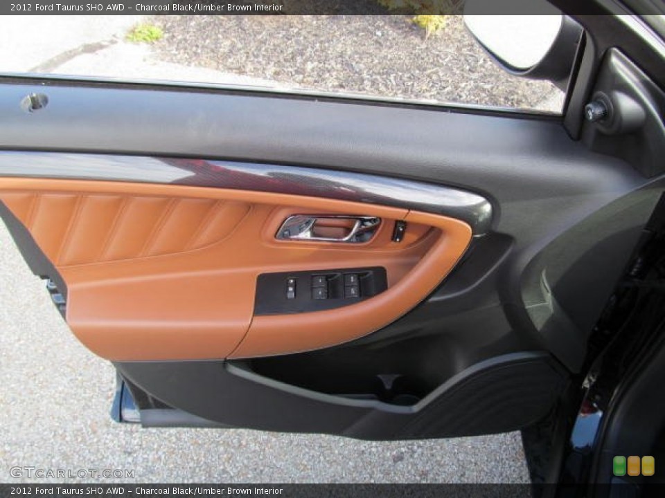 Charcoal Black/Umber Brown Interior Door Panel for the 2012 Ford Taurus SHO AWD #72603668