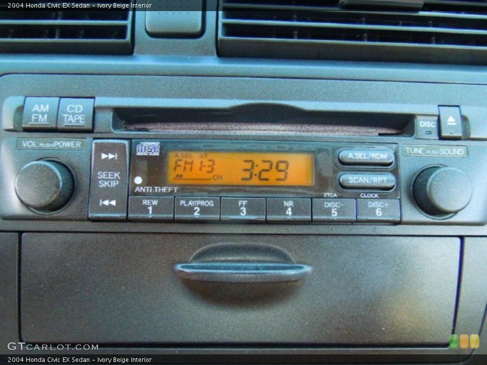 Ivory Beige Interior Audio System for the 2004 Honda Civic EX Sedan #72641957
