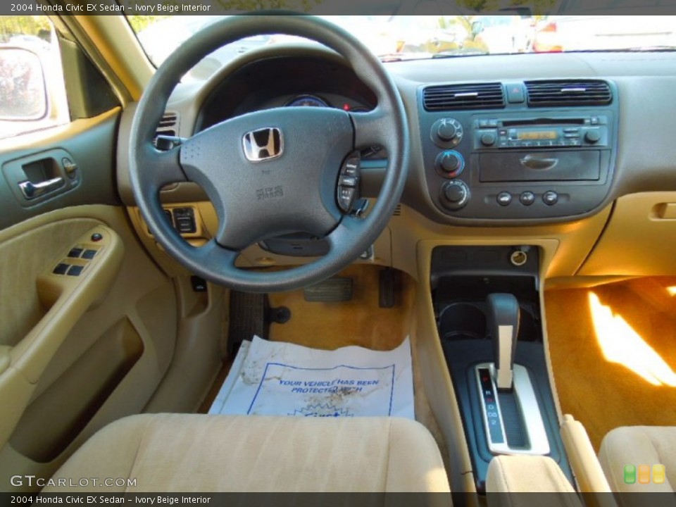 Ivory Beige Interior Dashboard for the 2004 Honda Civic EX Sedan #72642041