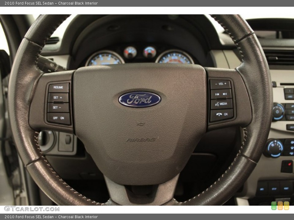 Charcoal Black Interior Steering Wheel for the 2010 Ford Focus SEL Sedan #72666610