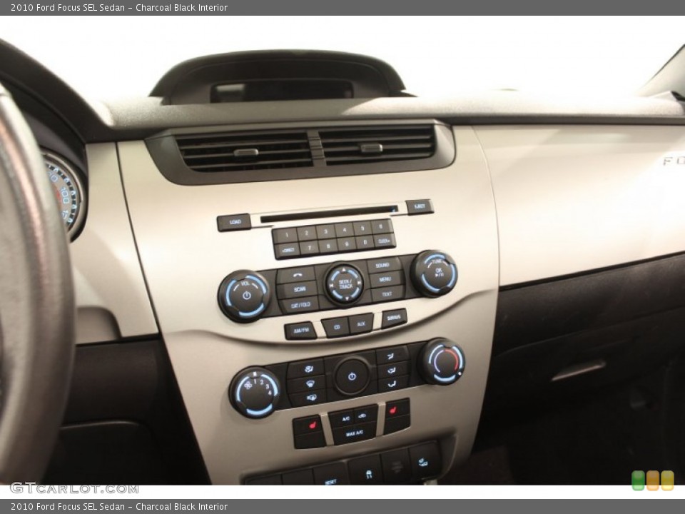 Charcoal Black Interior Controls for the 2010 Ford Focus SEL Sedan #72666659