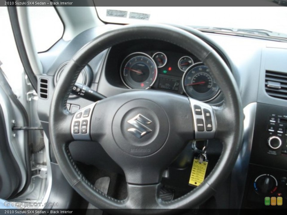 Black Interior Steering Wheel for the 2010 Suzuki SX4 Sedan #72671625