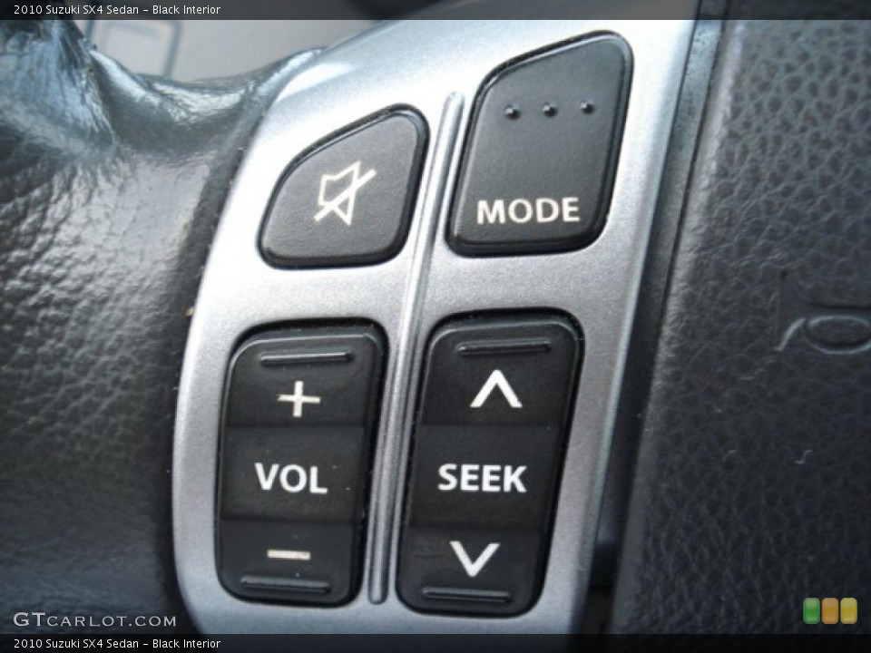 Black Interior Controls for the 2010 Suzuki SX4 Sedan #72671647