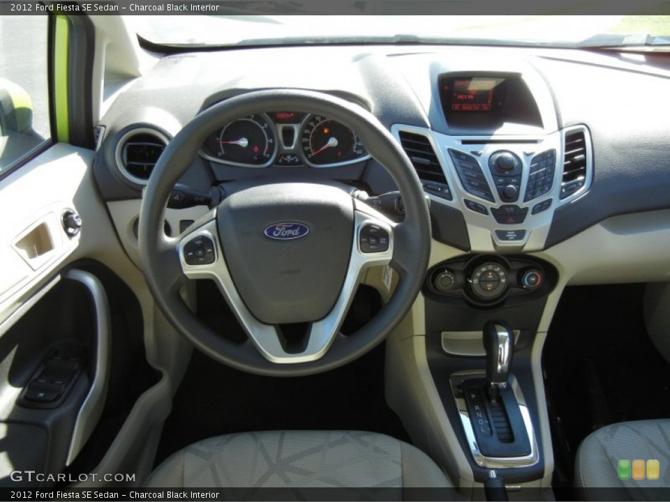 Charcoal Black Interior Dashboard for the 2012 Ford Fiesta SE Sedan #72687478