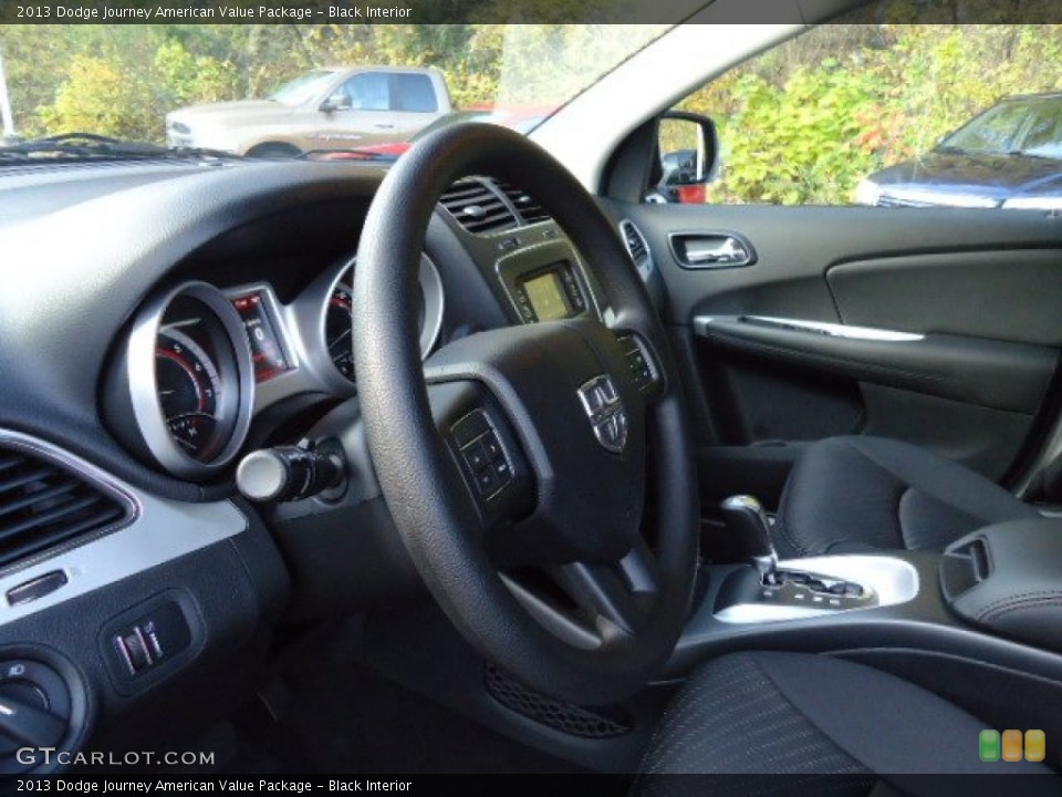 Black Interior Steering Wheel for the 2013 Dodge Journey American Value Package #72701092