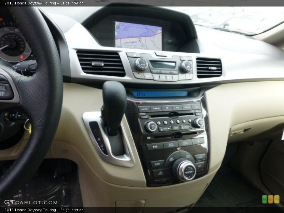 Beige Interior Controls for the 2013 Honda Odyssey Touring #72702133