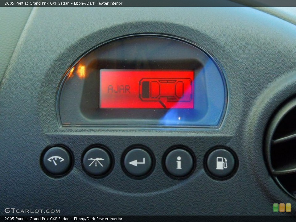 Ebony/Dark Pewter Interior Controls for the 2005 Pontiac Grand Prix GXP Sedan #72707741
