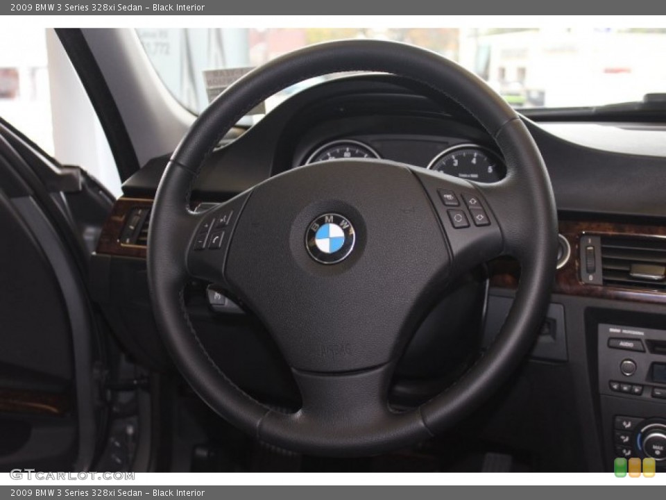 Black Interior Steering Wheel for the 2009 BMW 3 Series 328xi Sedan #72730826