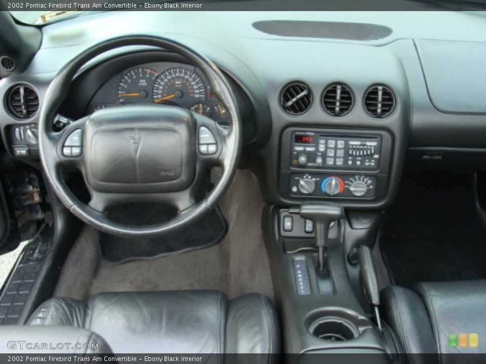 Ebony Black Interior Dashboard for the 2002 Pontiac Firebird Trans Am Convertible #72737525