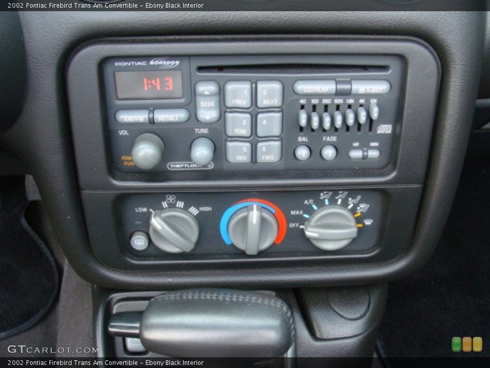 Ebony Black Interior Controls for the 2002 Pontiac Firebird Trans Am Convertible #72737586