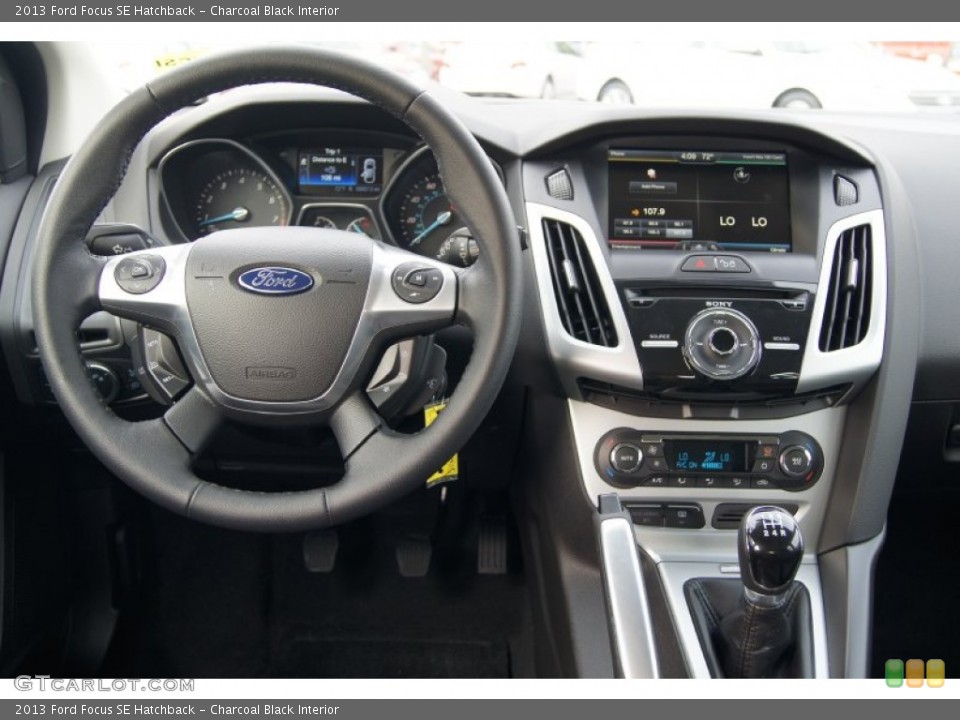 Charcoal Black Interior Dashboard for the 2013 Ford Focus SE Hatchback #72821413