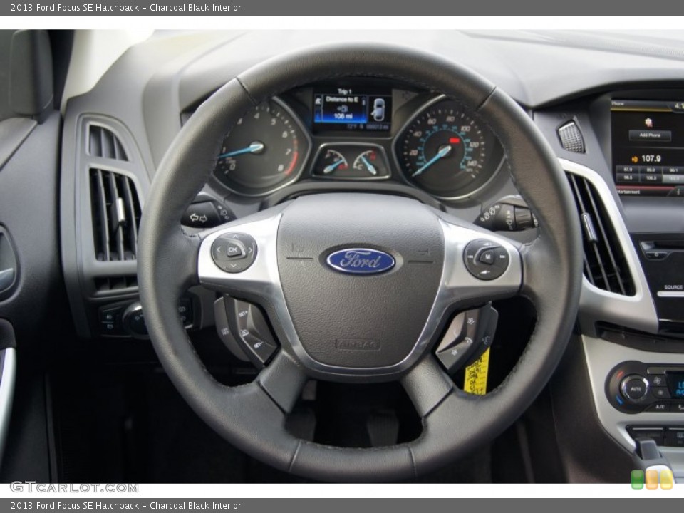 Charcoal Black Interior Steering Wheel for the 2013 Ford Focus SE Hatchback #72821419