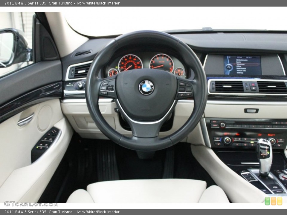 Ivory White/Black Interior Dashboard for the 2011 BMW 5 Series 535i Gran Turismo #72837387