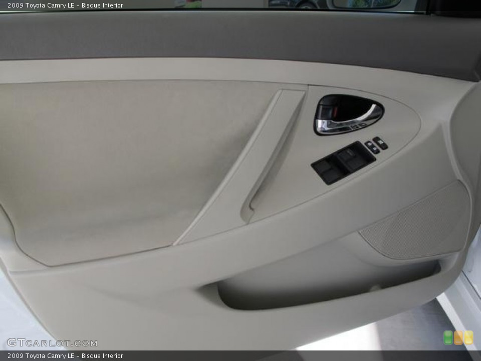 Bisque Interior Door Panel for the 2009 Toyota Camry LE #72844359
