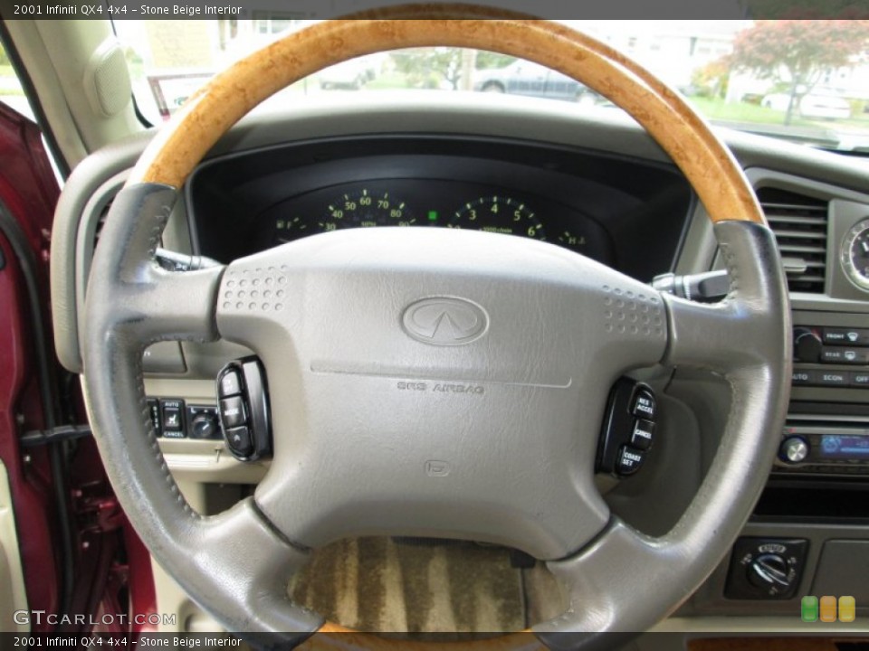Stone Beige Interior Steering Wheel for the 2001 Infiniti QX4 4x4 #72844915