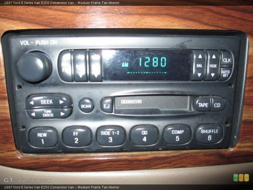Medium Prairie Tan Interior Audio System for the 1997 Ford E Series Van E150 Conversion Van #72907660