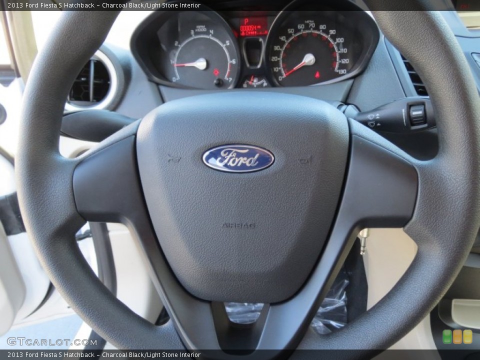 Charcoal Black/Light Stone Interior Steering Wheel for the 2013 Ford Fiesta S Hatchback #72917050