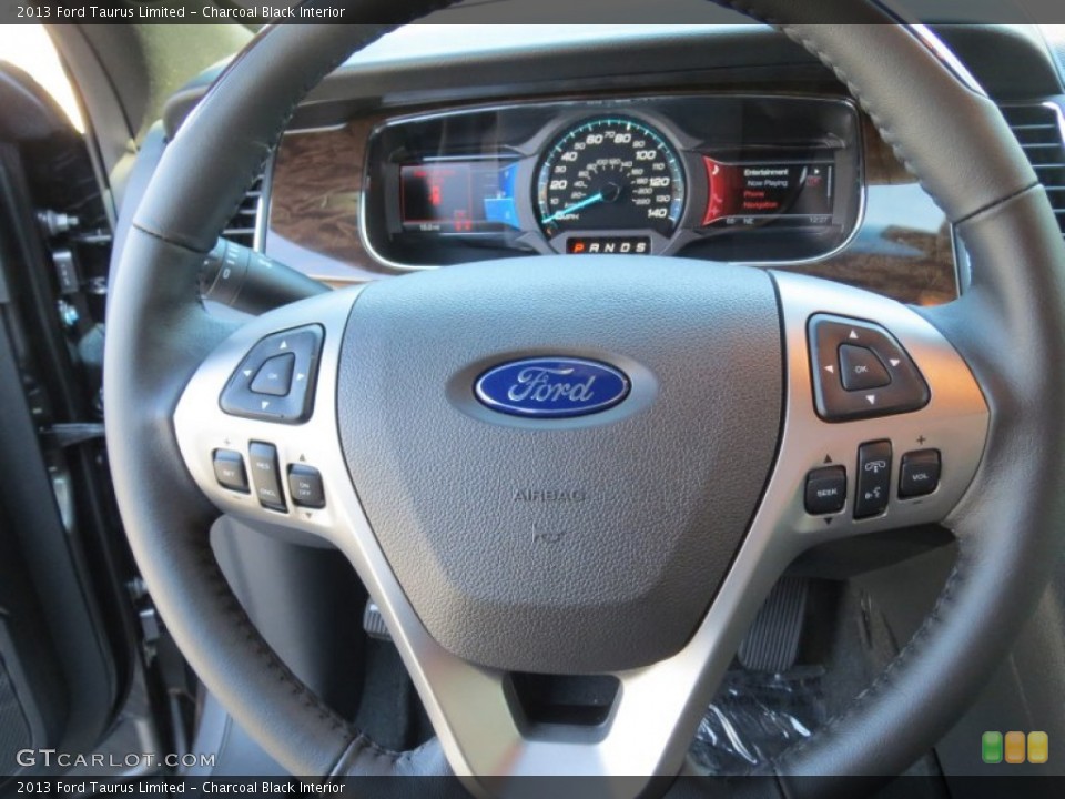 Charcoal Black Interior Steering Wheel for the 2013 Ford Taurus Limited #72918613