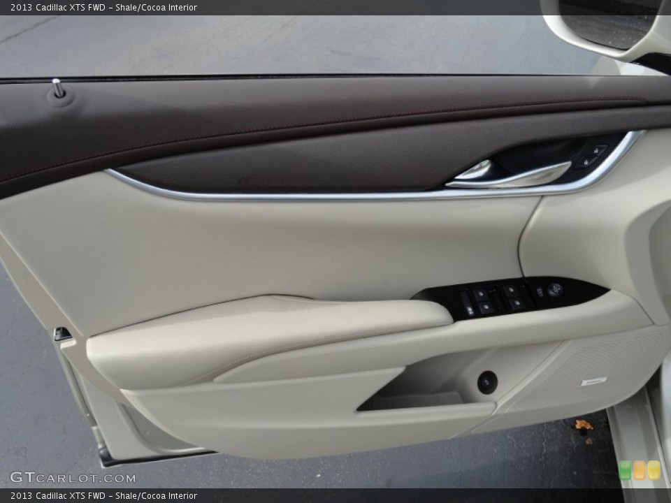 Shale/Cocoa Interior Door Panel for the 2013 Cadillac XTS FWD #72940078