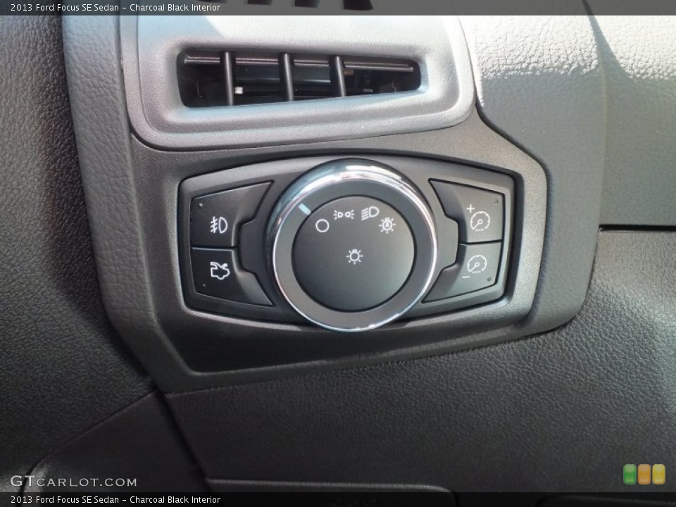 Charcoal Black Interior Controls for the 2013 Ford Focus SE Sedan #72971492