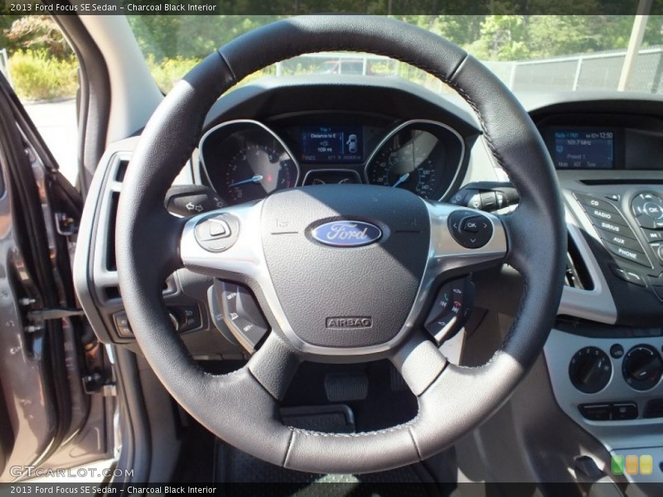 Charcoal Black Interior Steering Wheel for the 2013 Ford Focus SE Sedan #72971514