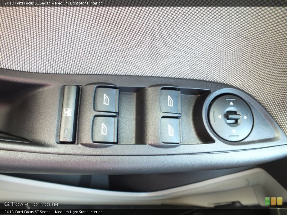 Medium Light Stone Interior Controls for the 2013 Ford Focus SE Sedan #73021192
