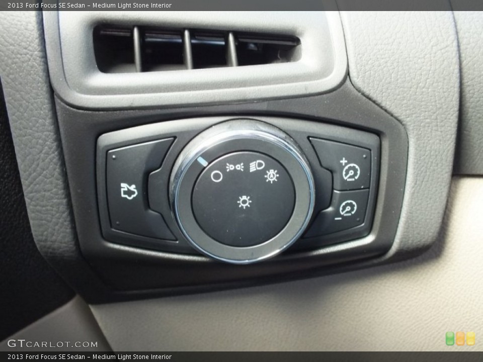 Medium Light Stone Interior Controls for the 2013 Ford Focus SE Sedan #73021219