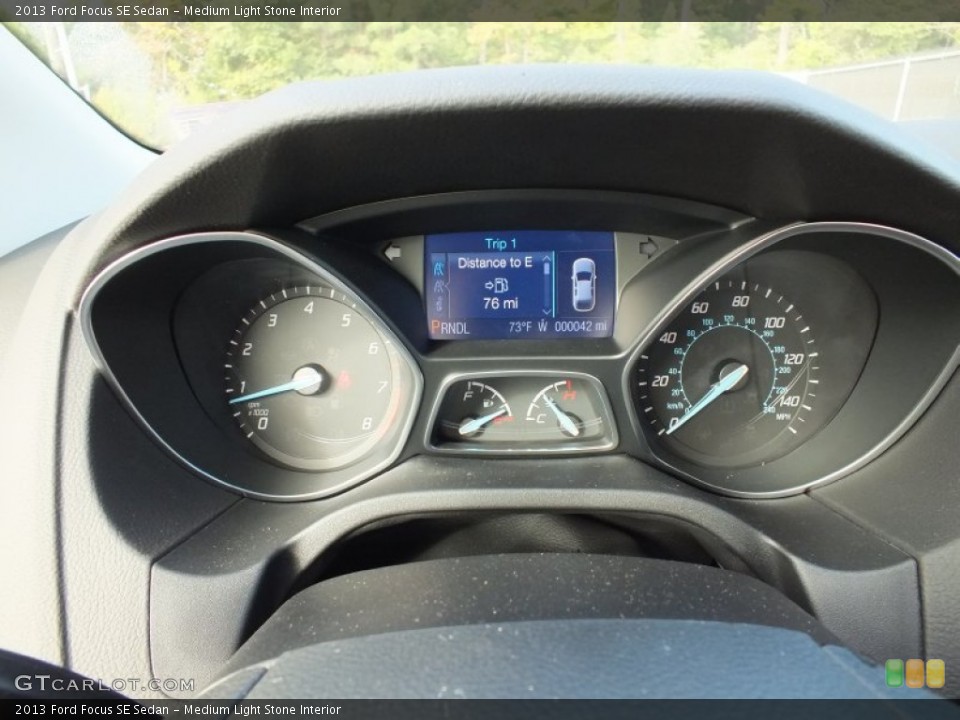 Medium Light Stone Interior Gauges for the 2013 Ford Focus SE Sedan #73021270