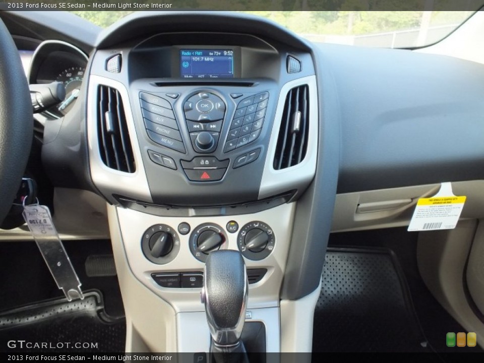 Medium Light Stone Interior Controls for the 2013 Ford Focus SE Sedan #73021318