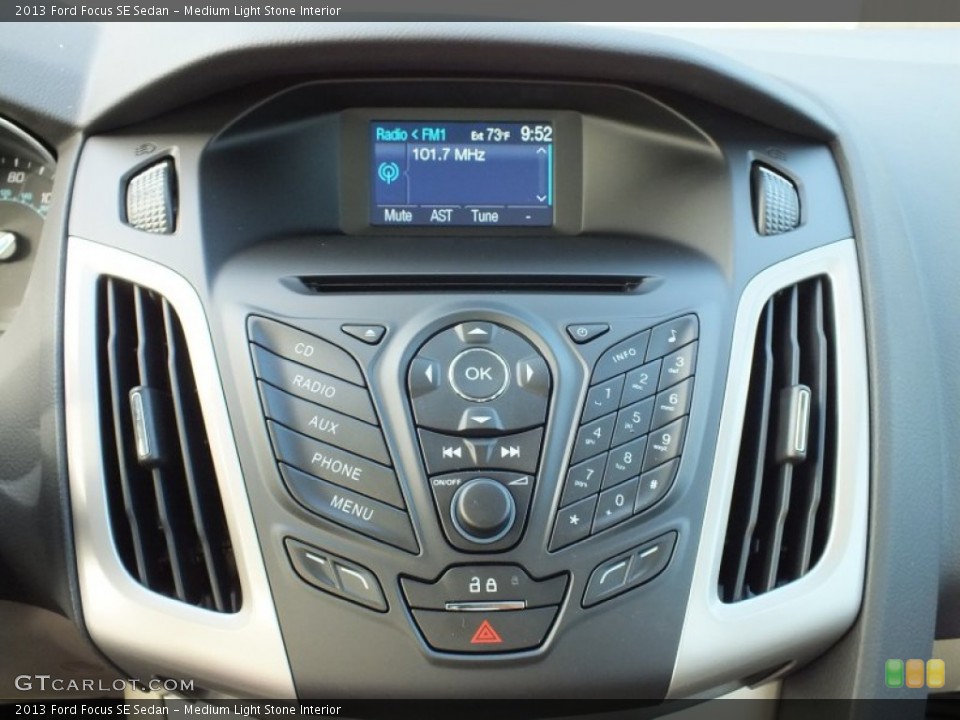 Medium Light Stone Interior Controls for the 2013 Ford Focus SE Sedan #73021345