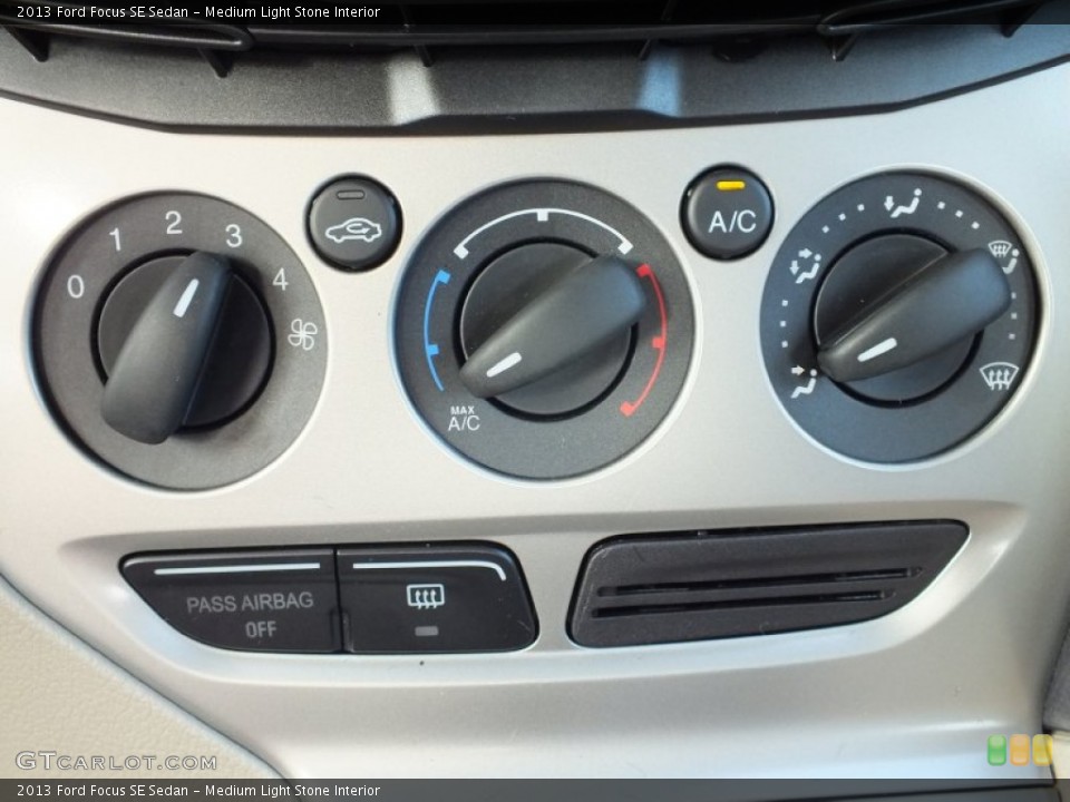 Medium Light Stone Interior Controls for the 2013 Ford Focus SE Sedan #73021369
