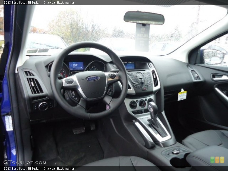 Charcoal Black Interior Dashboard for the 2013 Ford Focus SE Sedan #73022950