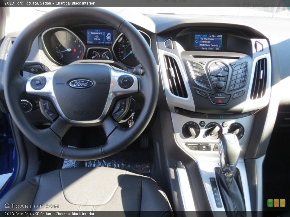 Charcoal Black Interior Dashboard for the 2013 Ford Focus SE Sedan #73030708