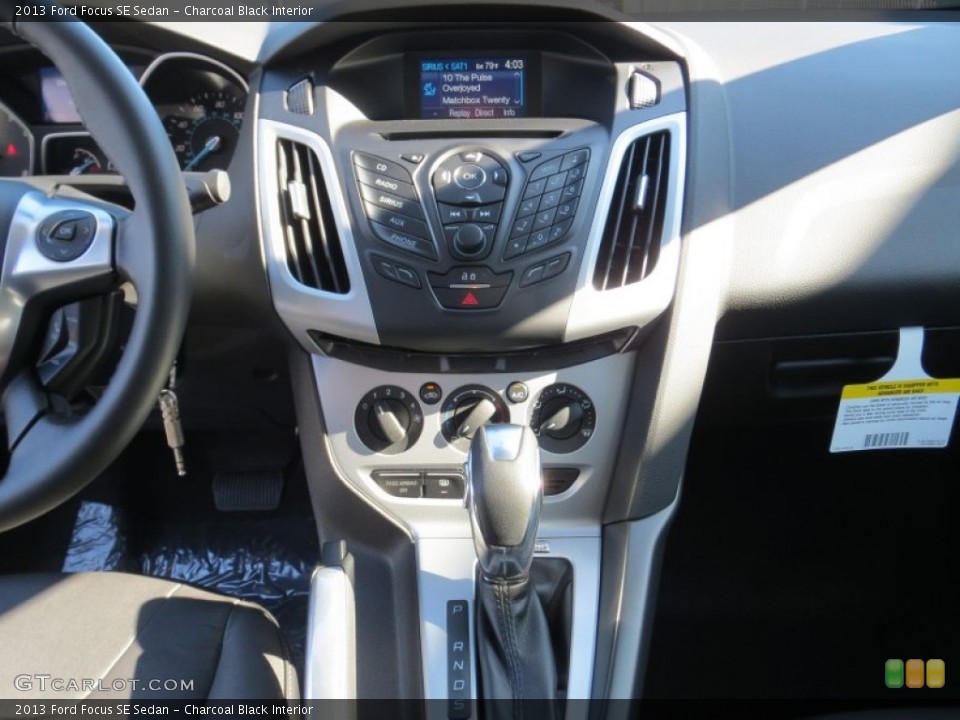 Charcoal Black Interior Controls for the 2013 Ford Focus SE Sedan #73030732