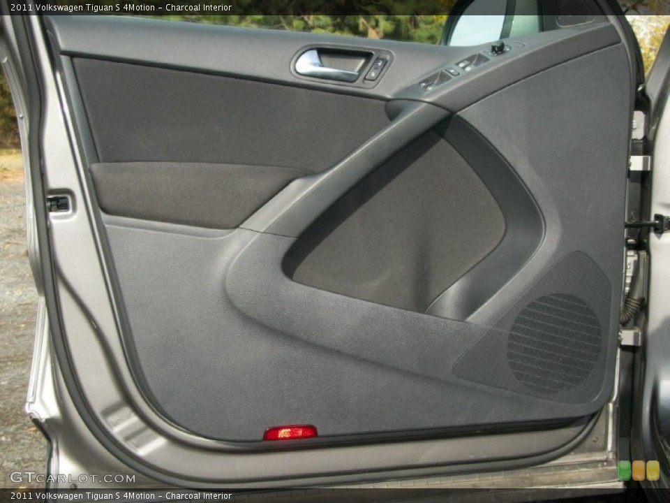 Charcoal Interior Door Panel for the 2011 Volkswagen Tiguan S 4Motion #73057393