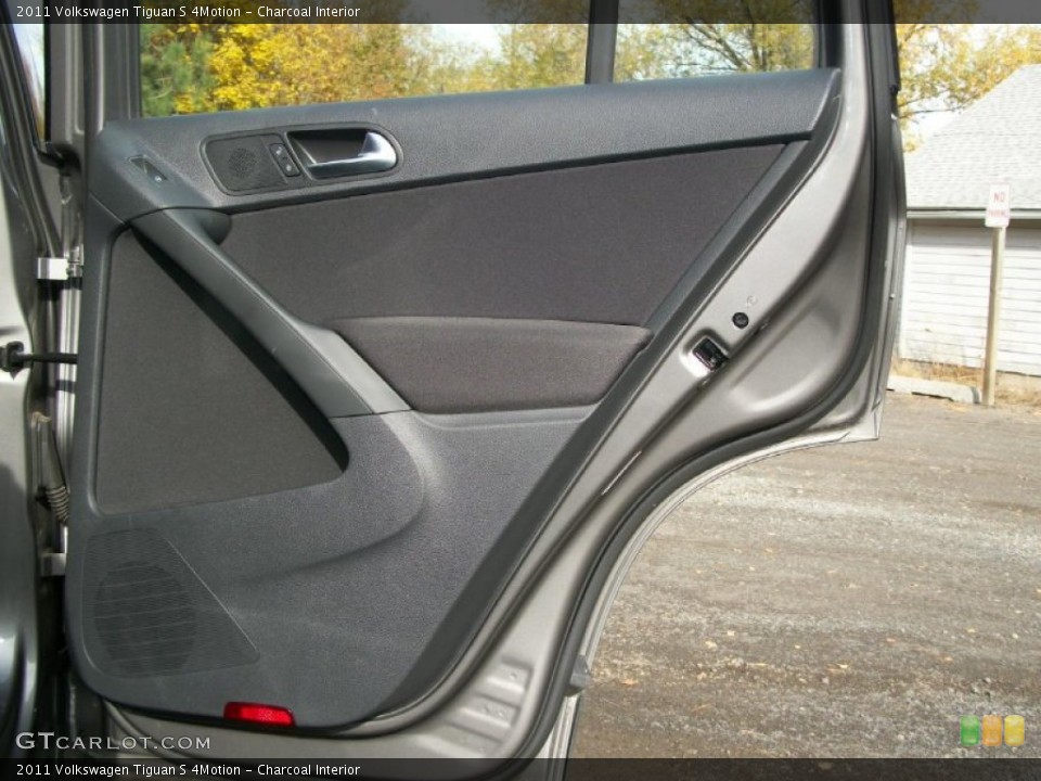 Charcoal Interior Door Panel for the 2011 Volkswagen Tiguan S 4Motion #73057560