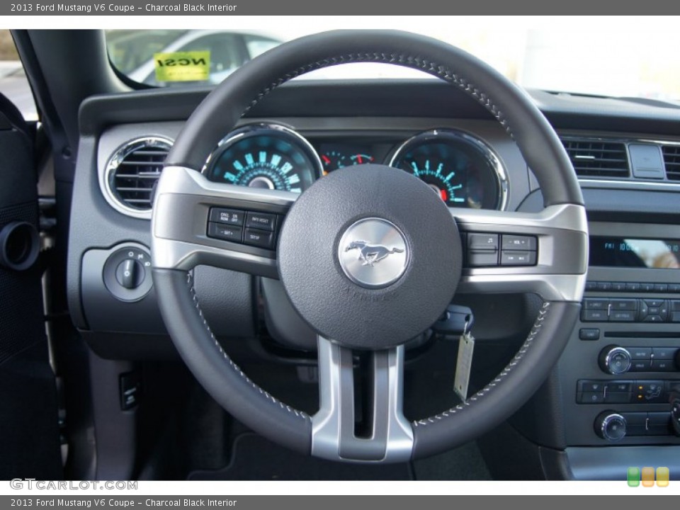 Charcoal Black Interior Steering Wheel for the 2013 Ford Mustang V6 Coupe #73083738