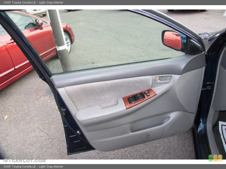 Light Gray Interior Door Panel for the 2005 Toyota Corolla LE #73140768
