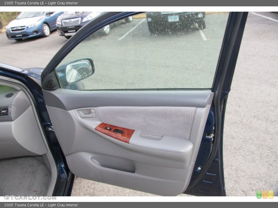 Light Gray Interior Door Panel for the 2005 Toyota Corolla LE #73140784