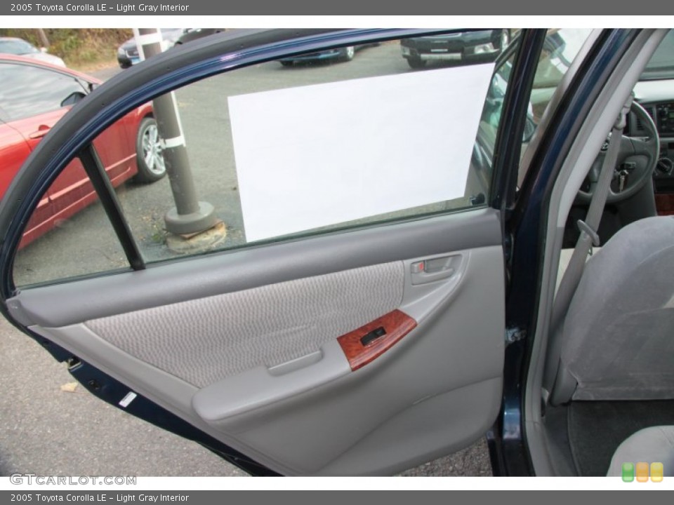 Light Gray Interior Door Panel for the 2005 Toyota Corolla LE #73140810