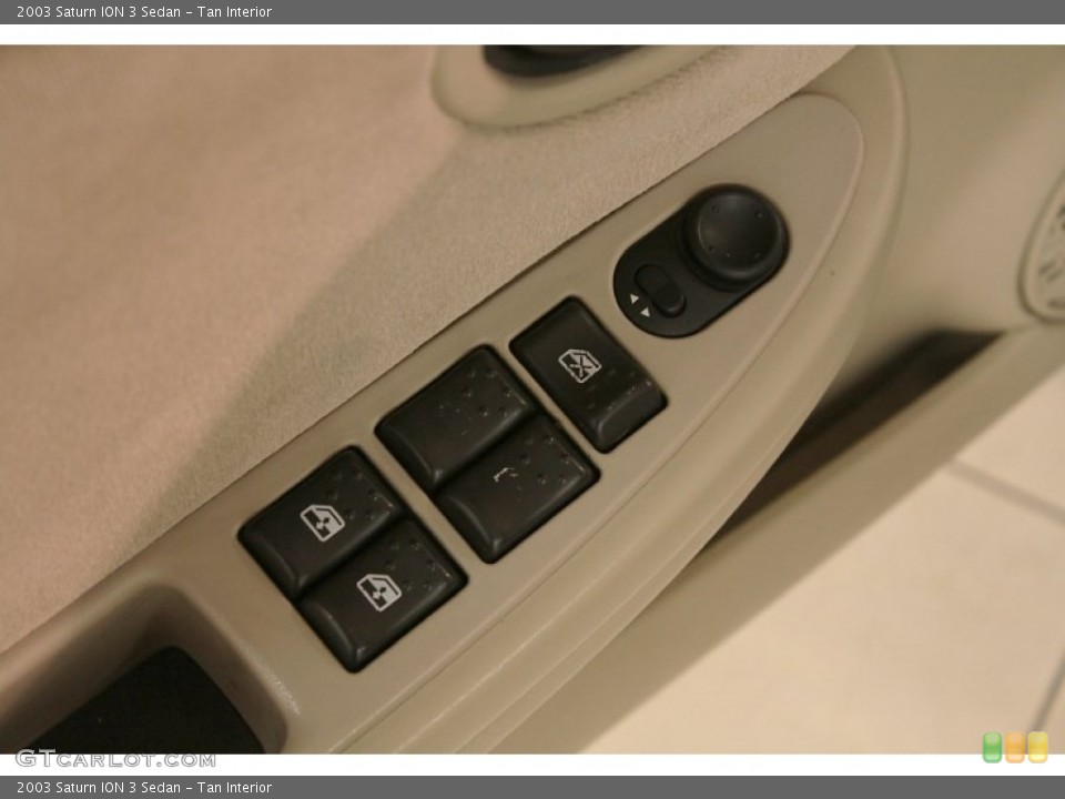 Tan Interior Controls for the 2003 Saturn ION 3 Sedan #73175457