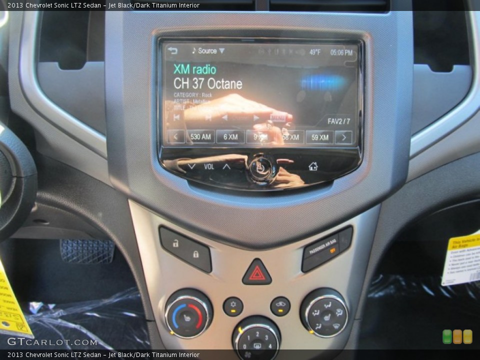 Jet Black/Dark Titanium Interior Controls for the 2013 Chevrolet Sonic LTZ Sedan #73188771