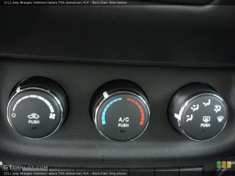 Black/Dark Olive Interior Controls for the 2011 Jeep Wrangler Unlimited Sahara 70th Anniversary 4x4 #73199885