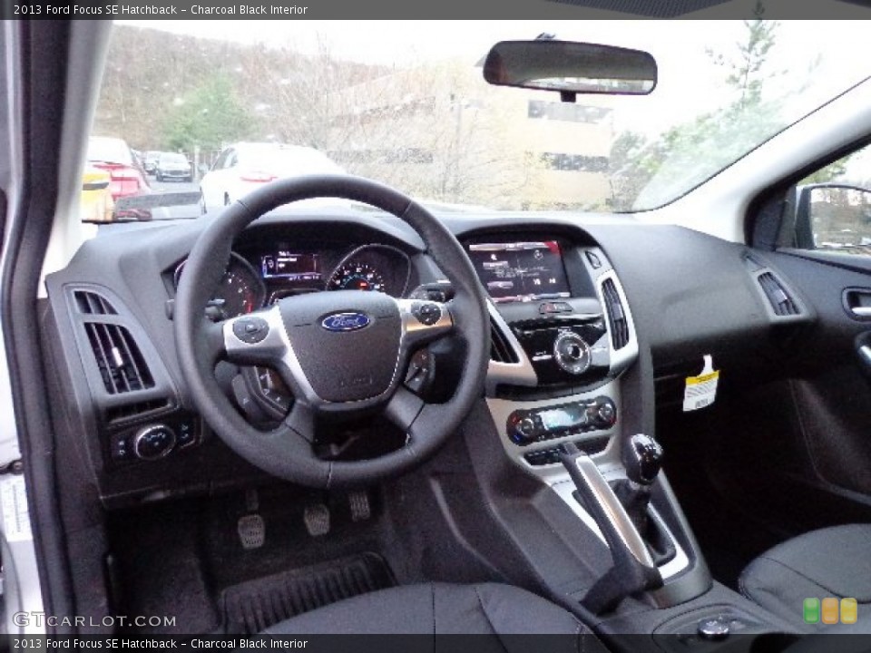 Charcoal Black Interior Dashboard for the 2013 Ford Focus SE Hatchback #73240304