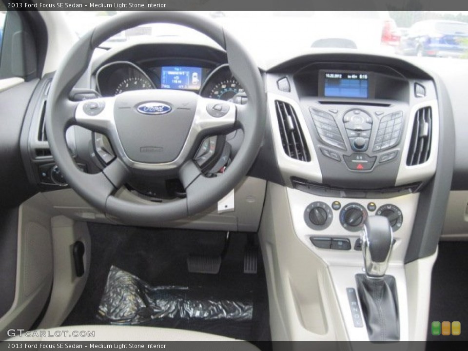 Medium Light Stone Interior Dashboard for the 2013 Ford Focus SE Sedan #73251225