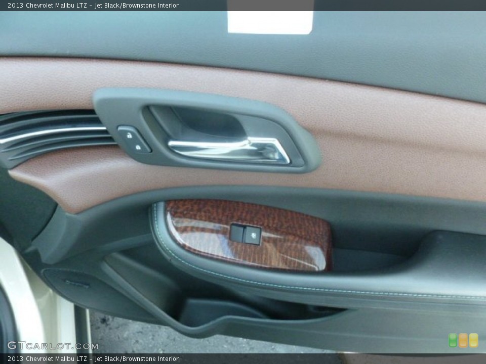 Jet Black/Brownstone Interior Door Panel for the 2013 Chevrolet Malibu LTZ #73257930